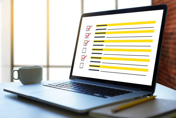 istock businessman SURVEY and Results Analysis Discovery Concept 1004112790