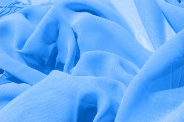 istock Background texture, pattern. Azure Blue Silk Twill. Here is a deluxe azure blue silk twill perfect for a vast array of applications. Almost as soft as a cloud, this remarkable silk has a supreme drape 1004113532