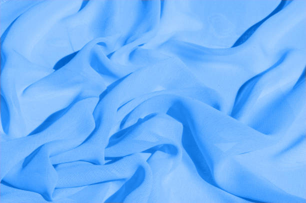 istock Background texture, pattern. Azure Blue Silk Twill. Here is a deluxe azure blue silk twill perfect for a vast array of applications. Almost as soft as a cloud, this remarkable silk has a supreme drape 1004113590