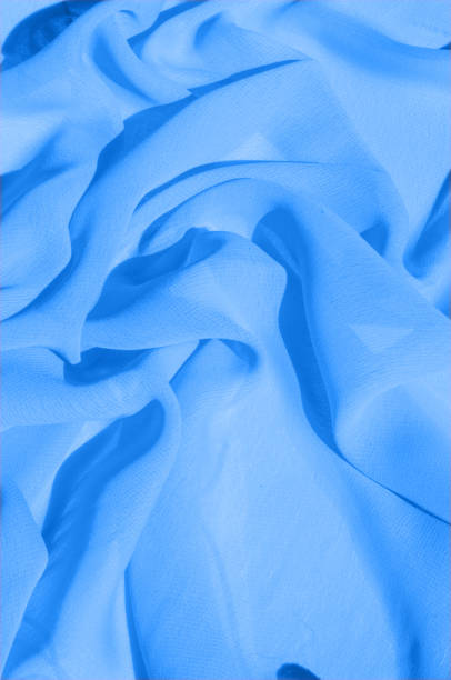 istock Background texture, pattern. Azure Blue Silk Twill. Here is a deluxe azure blue silk twill perfect for a vast array of applications. Almost as soft as a cloud, this remarkable silk has a supreme drape 1004113664