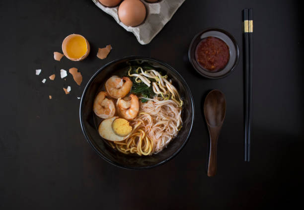 istock Malaysian Assam Laksa on Black Wooden Table 1004114114