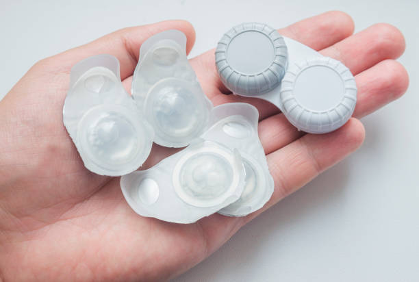 istock New contact lens in containers. 1004117466