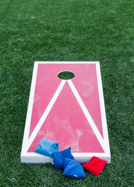 istock Red and white wooden corn hole game 1004117594