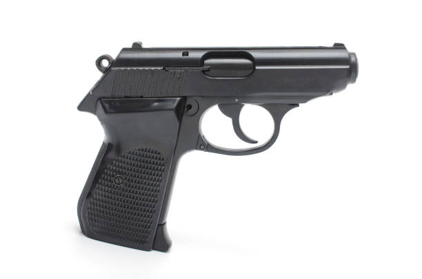 istock automatic pisto, handgunl on a white background 1004118150