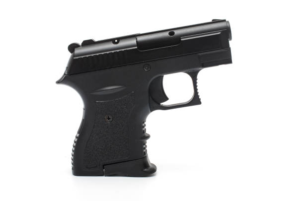 istock automatic pisto, handgunl on a white background 1004118160