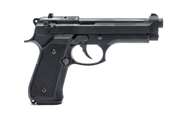 istock automatic pisto, handgunl on a white background 1004118172