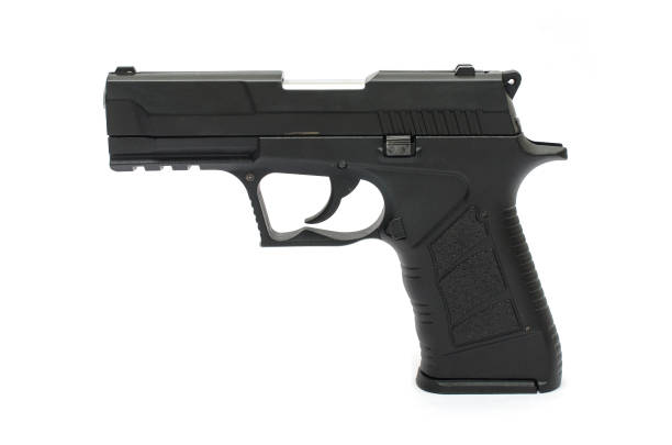 istock automatic pisto, handgunl on a white background 1004118200
