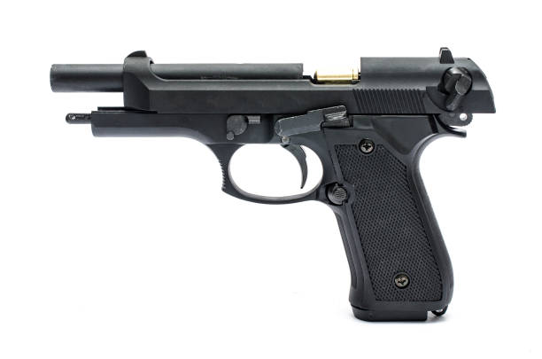 istock pistol with open slide isolated on white 1004118288