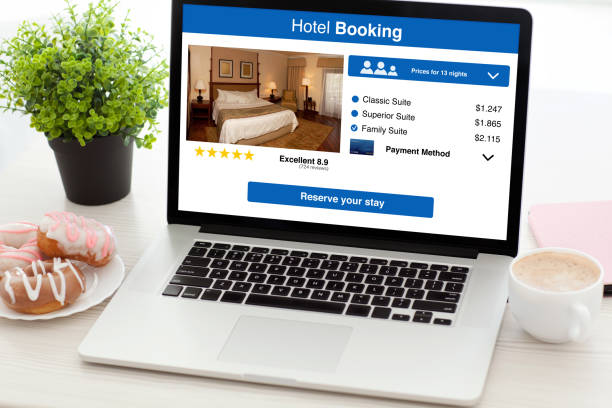 istock notebook with app hotel booking screen on desk in office 1004121290