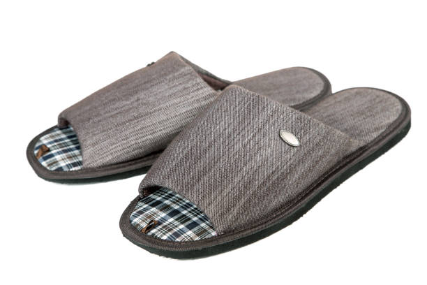 istock men's room slippers isolated on white background 1004127214