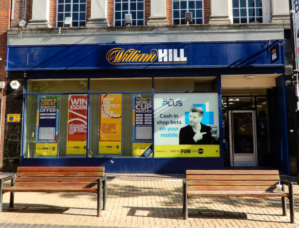 The frontage of William Hill Bookmakers in Winchester Street Basingstoke, United Kingdom - July 05 2018:   The frontage of William Hill Bookmakers in Winchester Street basingstoke photos stock pictures, royalty-free photos & images