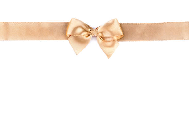 istock Golden bow with ribbon isolated on white background 1004165416