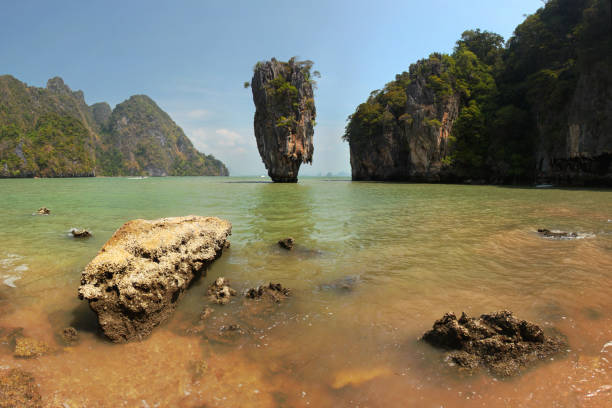 istock Khao Phing Kan (James Bond island) on a sunny day, Phang Nga, Thailand 1004186834