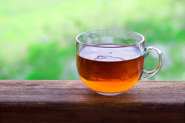 istock Transparent cup of black hot tea 1004191066
