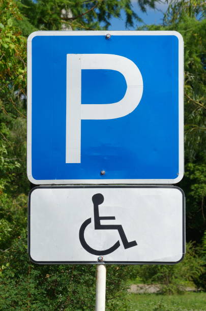 istock Road sign for disabled parking 1004191952