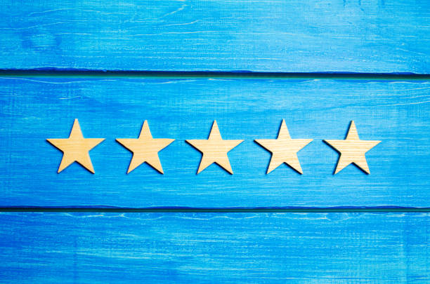 istock fifth star. Quality status is five stars. A new star, achievement, universal recognition.The critic determines the rating of the restaurant, hotel, institution. Quality mark. 1004193494