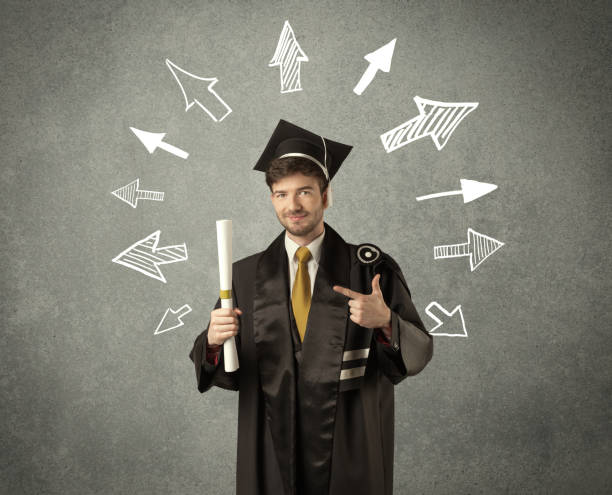 istock Young graduate student with hand drawn arrows 1004198416