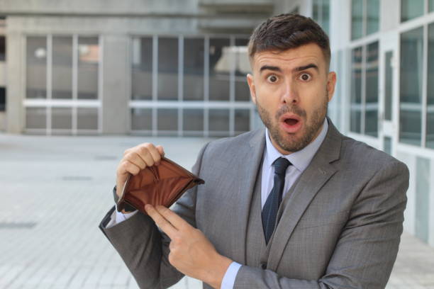 istock Shocked man with no money 1004212328