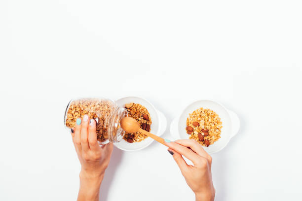 istock Woman doing healthy granola meal for two 1004213418