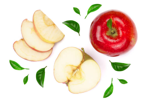 istock red apples with slices and leaves isolated on white background top view. Set or collection. Flat lay pattern 1004216938