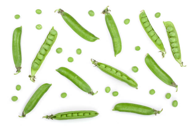 istock Fresh green pea pod isolated on white background. Top view. Flat lay pattern 1004217326