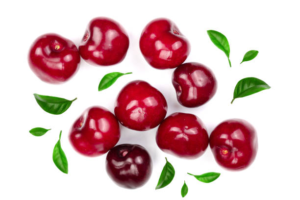 istock Sweet red cherries with leaves isolated on white background. Top view. Flat lay pattern 1004217330