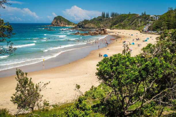 People at the beach in Flynns beach in Port Macquarie, Australia stock photo