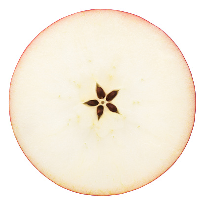 the cut apple in half, in the middle a seed, separately on a white background, clipping path