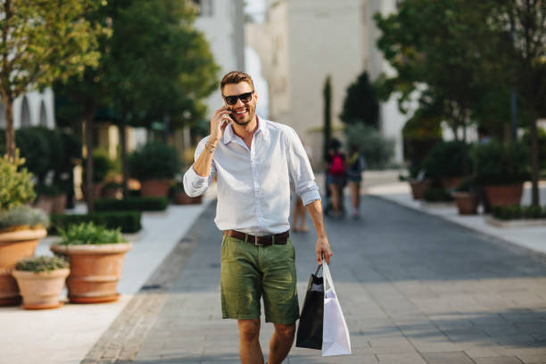 Young elegant man in the city