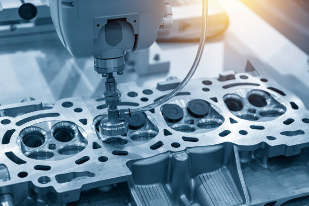 istock The boring machine make the hole at the cylinder head in the light blue scene. 1004244932