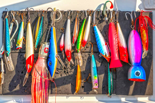 wobbler - blinker set on a fishing boat - pescaria com iscas artificiais imagens e fotografias de stock