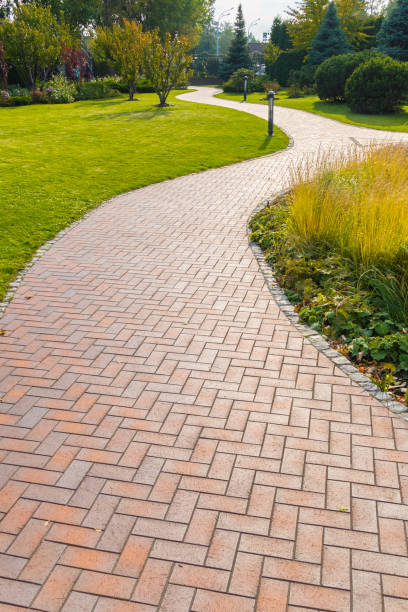 istock A place for walking after lunch. Park, path, green grass 1004259136