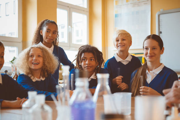 istock Group of students in chemistry lab class 1004263902