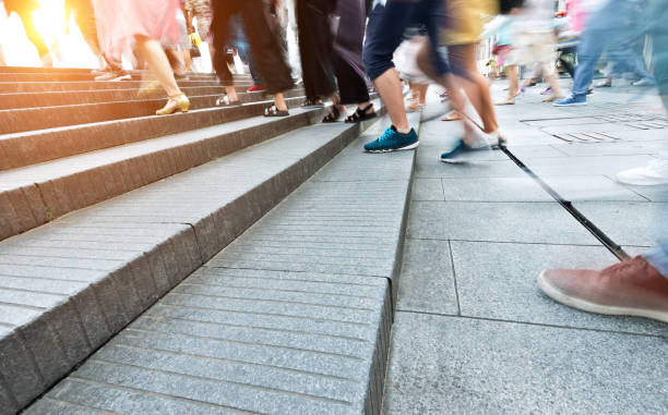 istock Human legs going up the stairs 1004266402