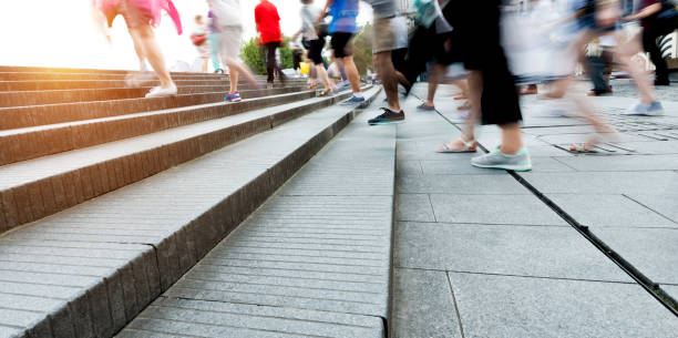 istock Human legs going up the stairs 1004266702