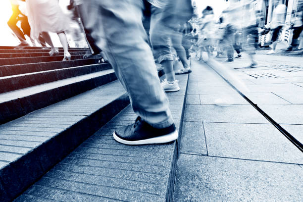 istock Human legs going up the stairs 1004266758