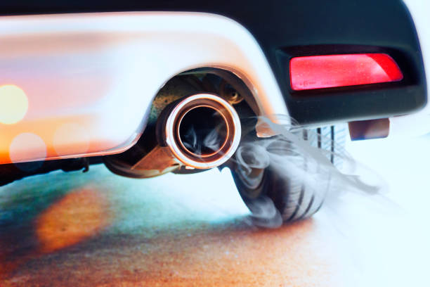 istock Stainless steel exhaust pipes on a silver car 1004276724