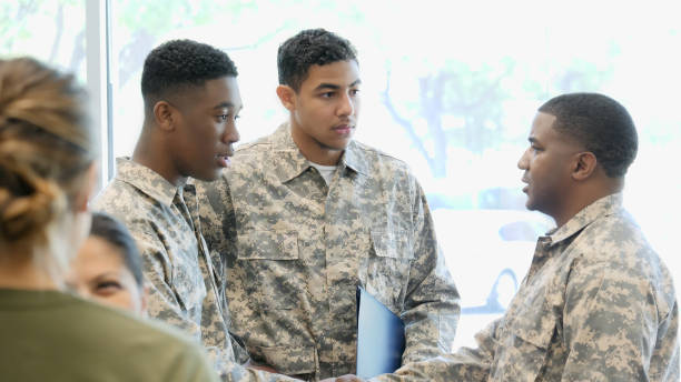 istock Young military cadets meet superior officer in training class 1004304312