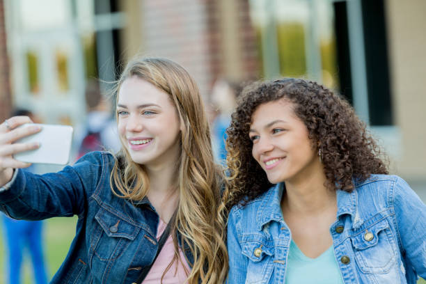 istock Teenage friends take selfie 1004308972