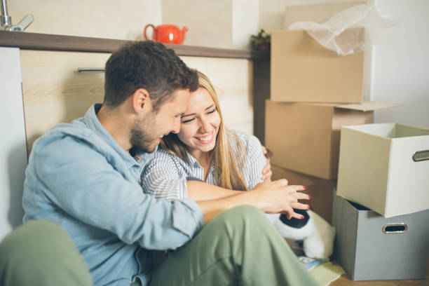 istock Young family enjoying their new home 1004327056