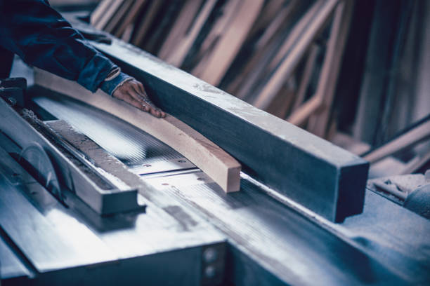 istock Male Carpenter Sanding Wooden Part 1004338206