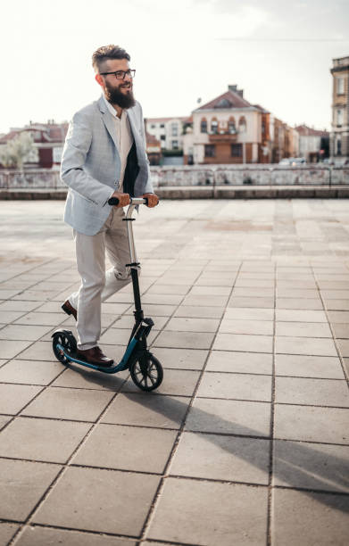 istock With scooter to the job 1004344898