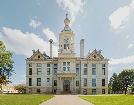 The beautiful Marshall County, Iowa courthouse as seen in 2017. This majestic building was designed by the same firm as the Iowa State Capitol building and was completed in 1886. This building was damaged by a tornado on July 19, 2018 which destroyed the cupola, damaged the roof, and blew out windows.
