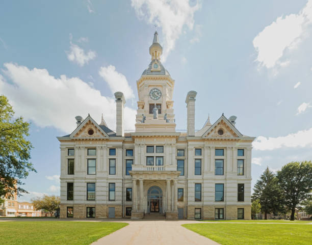 Marshall County, Iowa Courthouse The beautiful Marshall County, Iowa courthouse as seen in 2017. This majestic building was designed by the same firm as the Iowa State Capitol building and was completed in 1886. This building was damaged by a tornado on July 19, 2018 which destroyed the cupola, damaged the roof, and blew out windows. iowa photos stock pictures, royalty-free photos & images