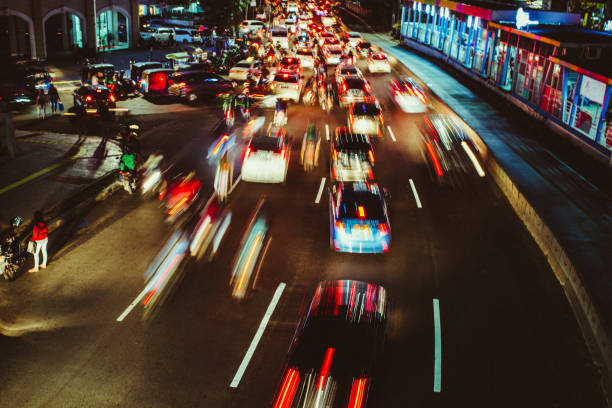 istock car night traffic city 1004348622
