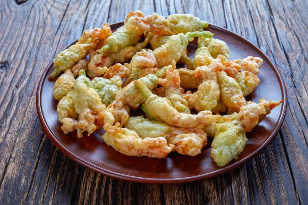 istock deep fried in tempura zucchini flowers 1004363024