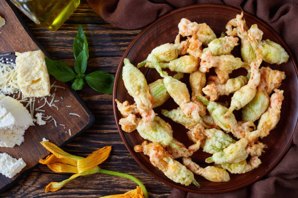 istock deep fried zucchini flowers on a plate 1004363142