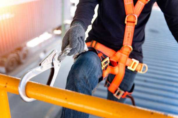 istock Construction worker use safety harness and safety line working on a new construction site project.Harness is a equipment for safety in construction site. 1004369888