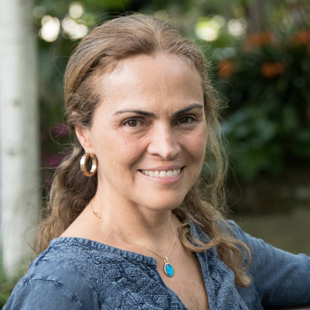 istock Smiling hispanic woman looking at the camera 1004387964