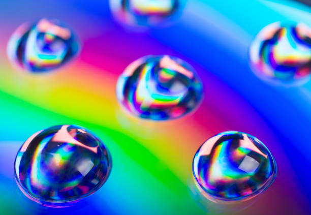 istock Soft focus blurred drops of liquid in neon colors 1004399350